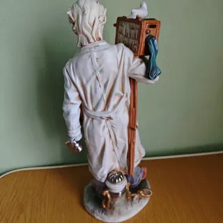 Figura fotógrafo antiguo porcelana