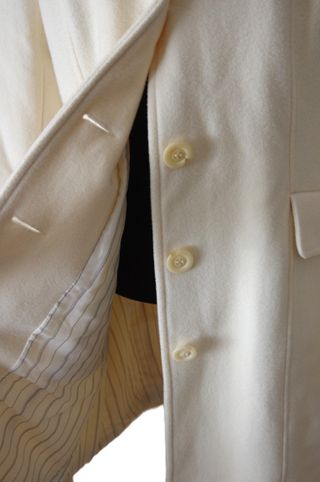 Abrigo de lana blanco estilizado de lana