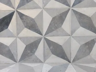 Baldosa hidráulica antigua diseño geométrico