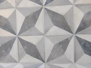 Baldosa hidráulica antigua diseño geométrico