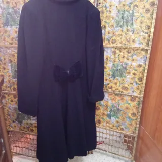 Elegante abrigo negro