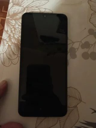 Xiaomi Redmi A5 con protector y funda