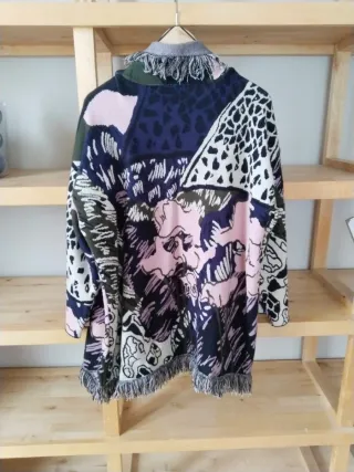 Rebeca multicolor con flecos