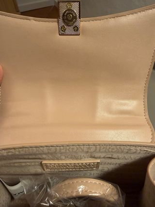 Pochette beige con manico dorato