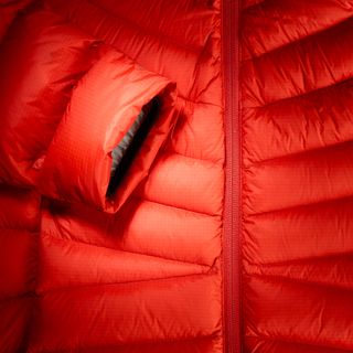 Plumífero de montaña y trekking con capucha Mujer Forclaz