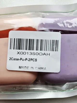 Due cover per auricolari di silicone lilla e rosa