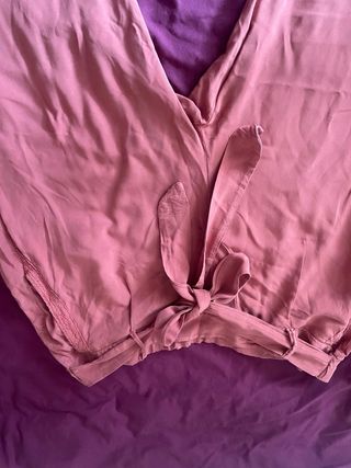Pantalón fluido rosa con lazada