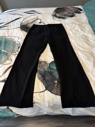 Pantalones negros y americanas