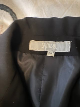 Pantalones negros y americanas