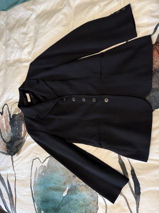 Pantalones negros y americanas