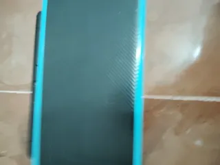 Nintendo 2DS XL con 2 giochi e una custodia