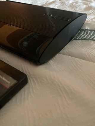 Consola PS3 Súper Slim Negra + 2 Mandos + Juegos