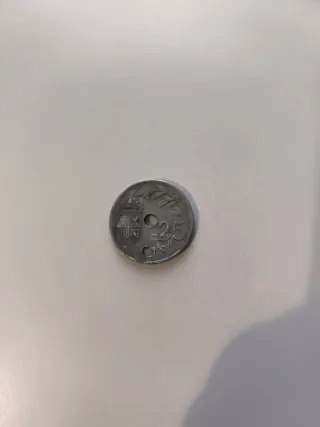 Moneda 25 centimos con agujero