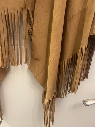 Chaqueta con flecos beige