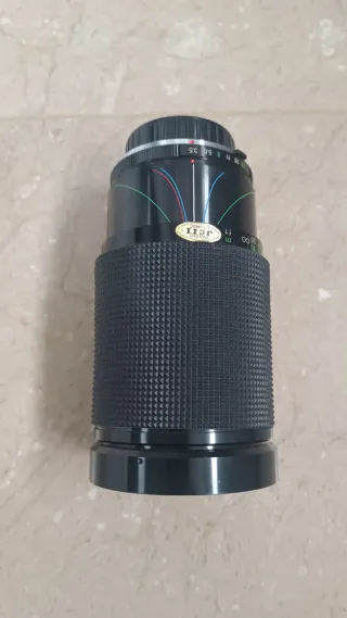 Cámara Olympus OM10 con objetivos, flax y bolsa