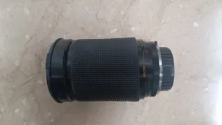 Cámara Olympus OM10 con objetivos, flax y bolsa