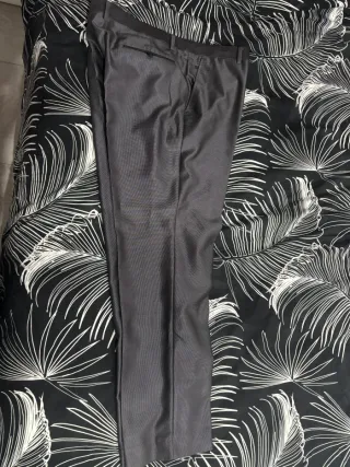 TRAJE DE HOMBRE PUROEGO.