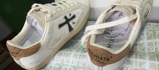 Zapatillas Premiata Doradas y Blancas