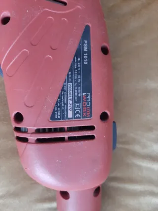 Taladro percutor con brocas