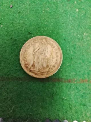 Moneda antigua de plata