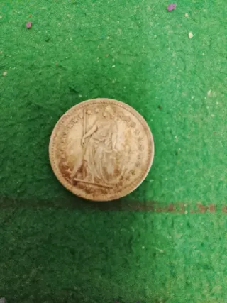 Moneda antigua de plata