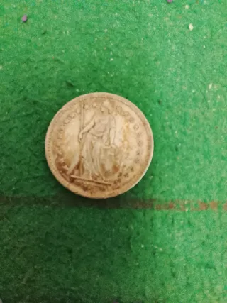 Moneda antigua de plata