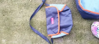 Carrito de muñecas azul y naranja. Juguettos