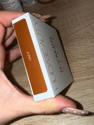 Iluminador Huda Beauty N.Y.M.P.H. Glaze