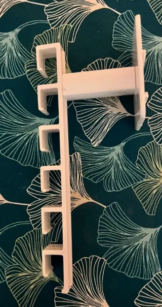 Organizzatore adesivo per cappelli