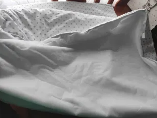 Cuna portátil con estrellas