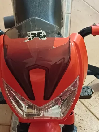 Motocicleta de juguete con motor electrico