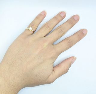 Anillo de oro de 18k con Perla, 0.89 g, T-14.
