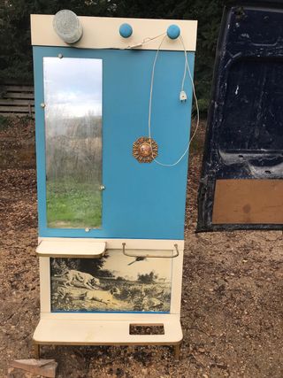 Paragüero vintage con espejo y luz