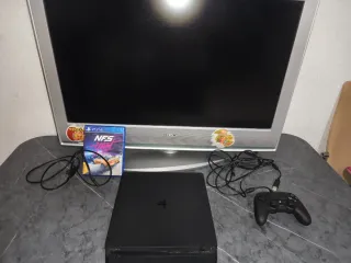 PS4 Slim 850GB + TV + Mando Nacon