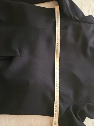 Giacca blu con inserti in camoscio.