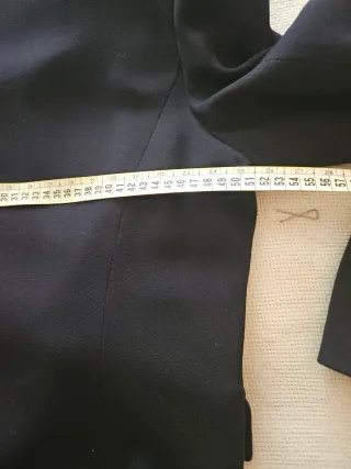 Giacca blu con inserti in camoscio.