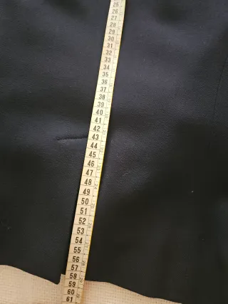 Giacca blu con inserti in camoscio.