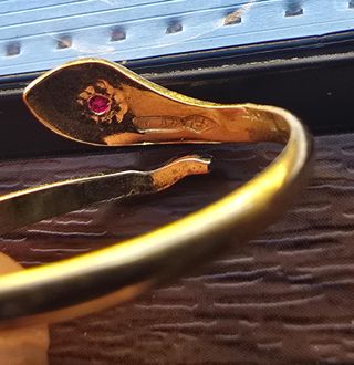 Anello serpente oro con rubino