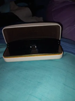 Gafas de sol Louis Vuitton negras y doradas