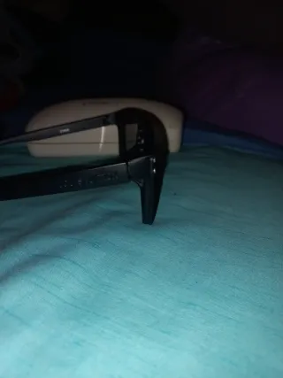 Gafas de sol Louis Vuitton negras y doradas