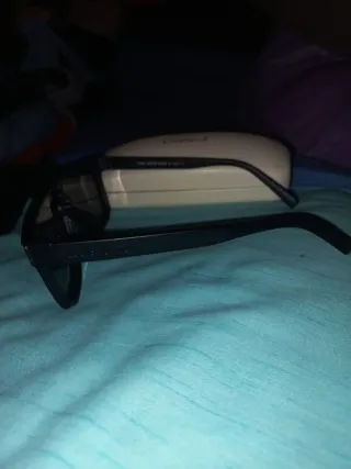 Gafas de sol Louis Vuitton negras y doradas