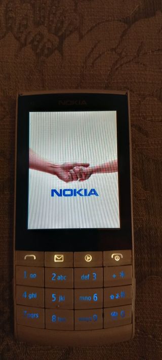 Nokia X3-02 funzionante con caricabatterie