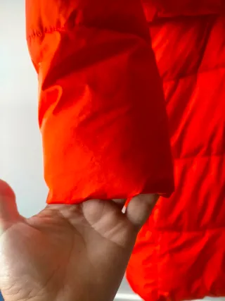 Chaqueta acolchada naranja larga