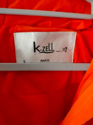 Chaqueta acolchada naranja larga