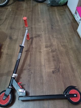 Patín infantil con diseño de carreras