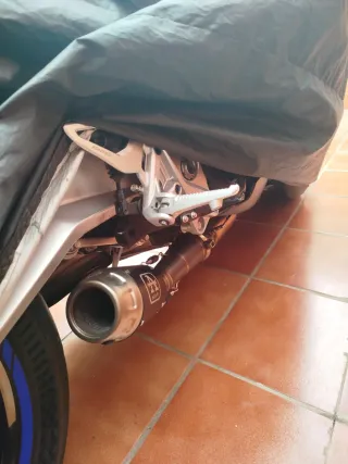 Escape Arrow para Moto