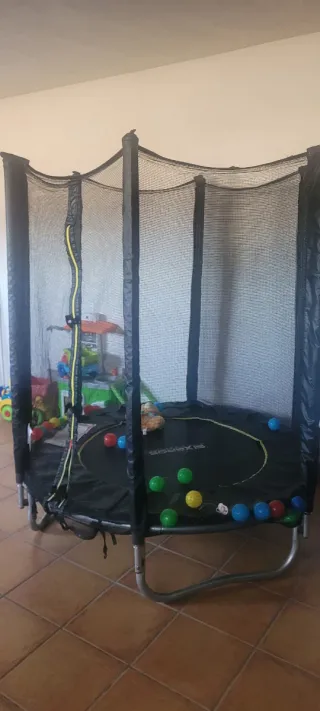 Cama elástica infantil con red de seguridad