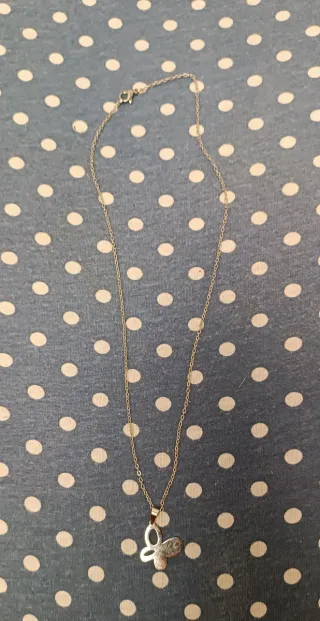 Collar mariposa acero