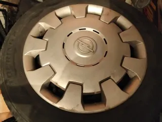 Ruedas completas con tapacubos Opel