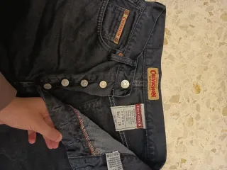 Vaquero Chevignon negro talla 29.